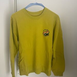 Stüssy Loni Crew Sweatshirt in the color Citrus.